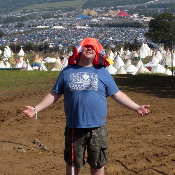 Rob Donovan beckoning to Narnia whilst working at Glastonbury Festival
