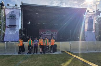 Crew Group Photo Infront Of Stage Cropped