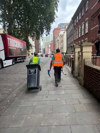 Jerry Pulling Bin Along