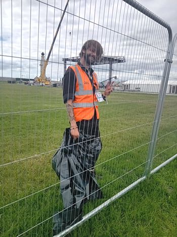 Dafydd Behind Fence