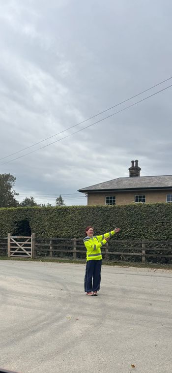 Crew Member Directing Taffic