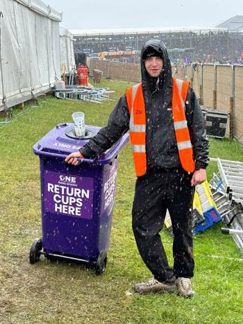 Crew Member In Rain