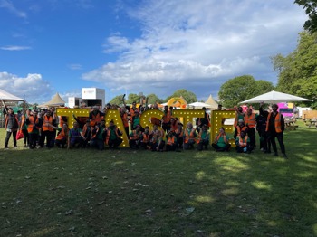 Group Picture With Sign